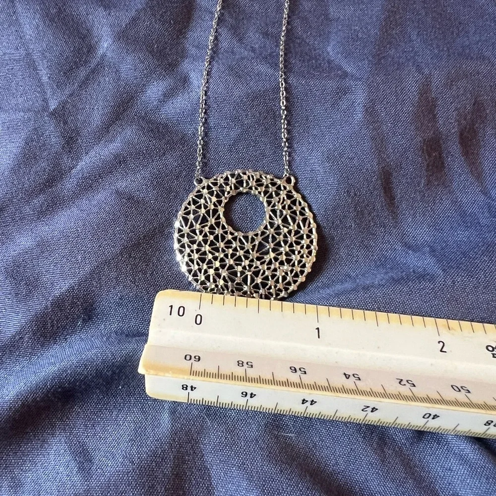 Silver Teardrop Earrings with Intricate Design